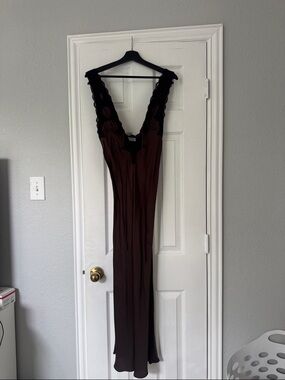 Rumored brown silk dress